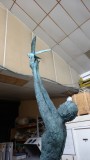 Top of the Gibran Sculpture Series Speak to us of Freedom bronze. The Dove of Peace being released from upstretched arms.