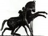 Photo of bronze prancing horse sculpture being restrained by two naked men, one each side, gripping the halter. In black modelling clay with a timber support at the front.